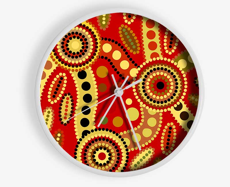 Aboriginal Red Tribal clock made from natural bamboo with a vibrant tribal design and clear Plexiglas lens.